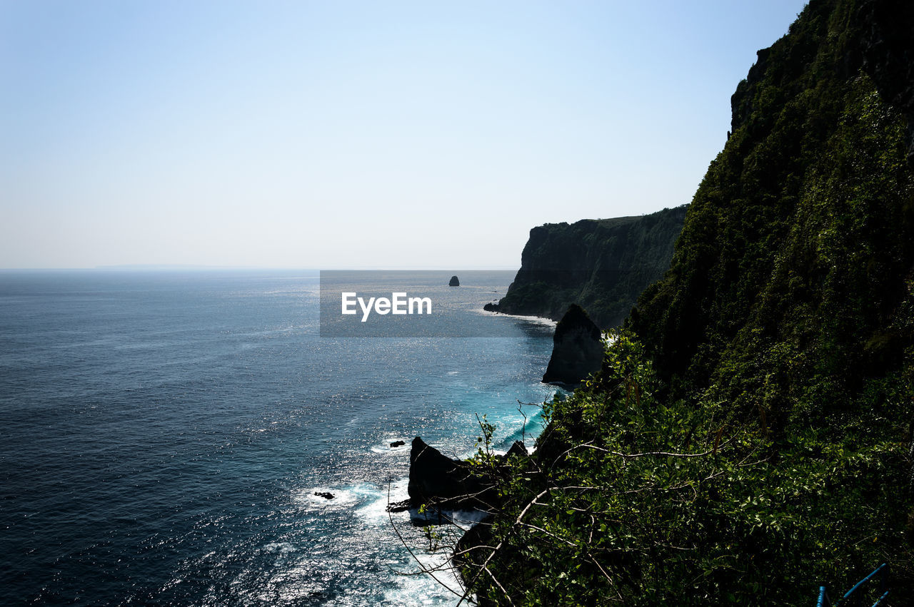 Scenic view of sea against clear sky