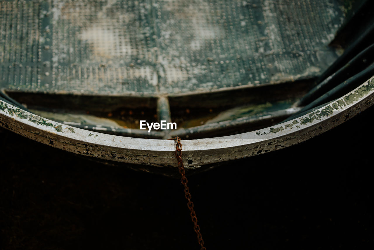 close-up, no people, reflection, mode of transportation, light, vehicle, water, black, transportation, indoors, darkness, macro photography, glasses