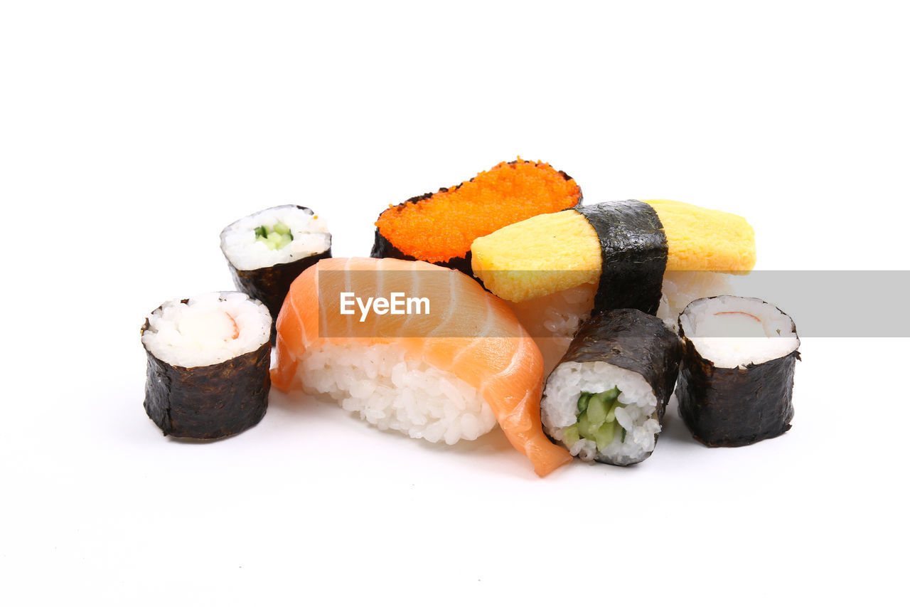 CLOSE-UP OF SUSHI SERVED IN PLATE