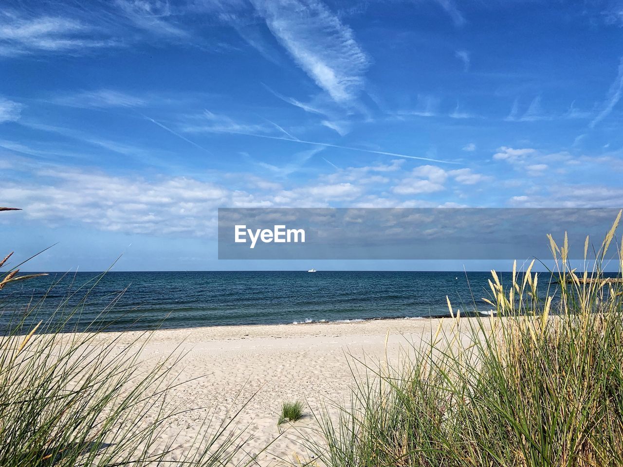 VIEW OF BEACH AGAINST SKY