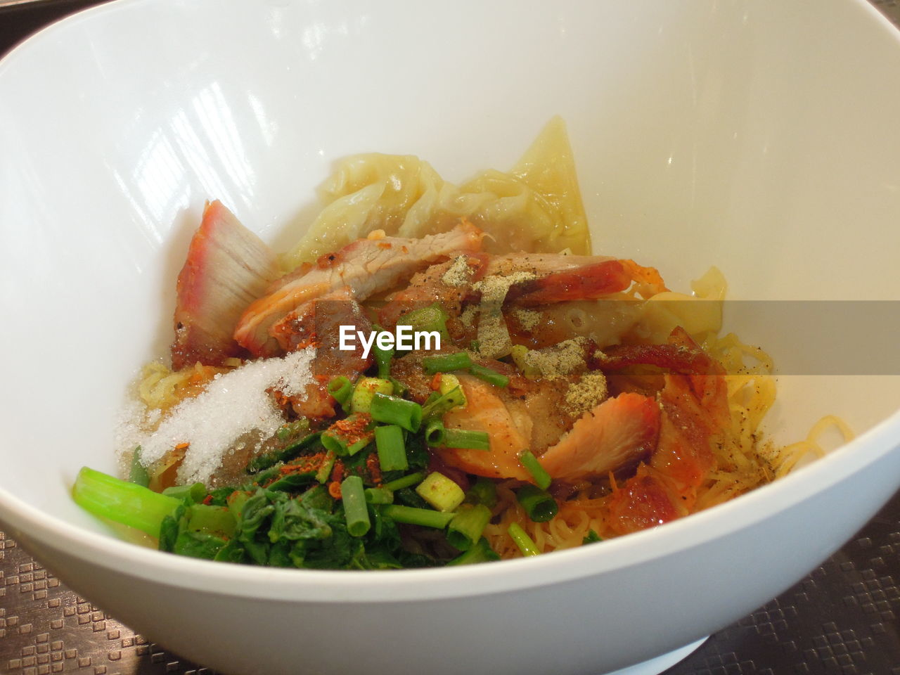 CLOSE-UP OF MEAT WITH RICE IN BOWL