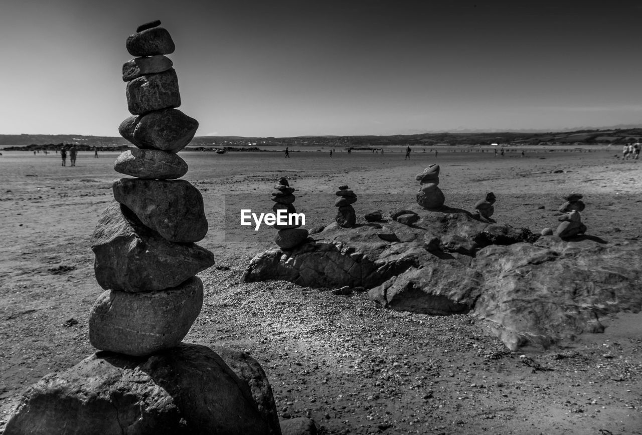 VIEW OF ROCKS ON BEACH AGAINST SKY