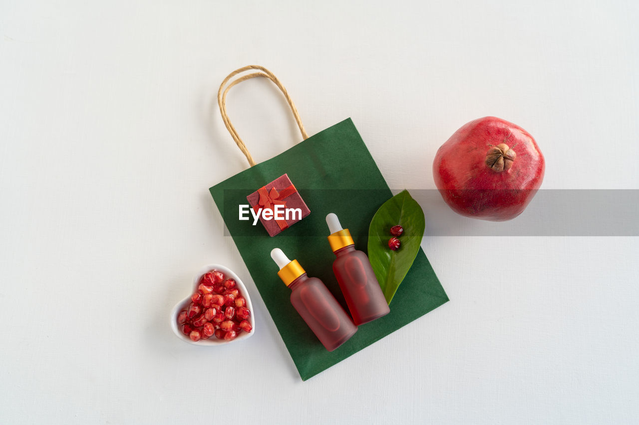 food and drink, food, fruit, healthy eating, studio shot, red, indoors, wellbeing, freshness, high angle view, apple - fruit, no people, still life, green, apple, white background, produce, group of objects, sweet food, copy space