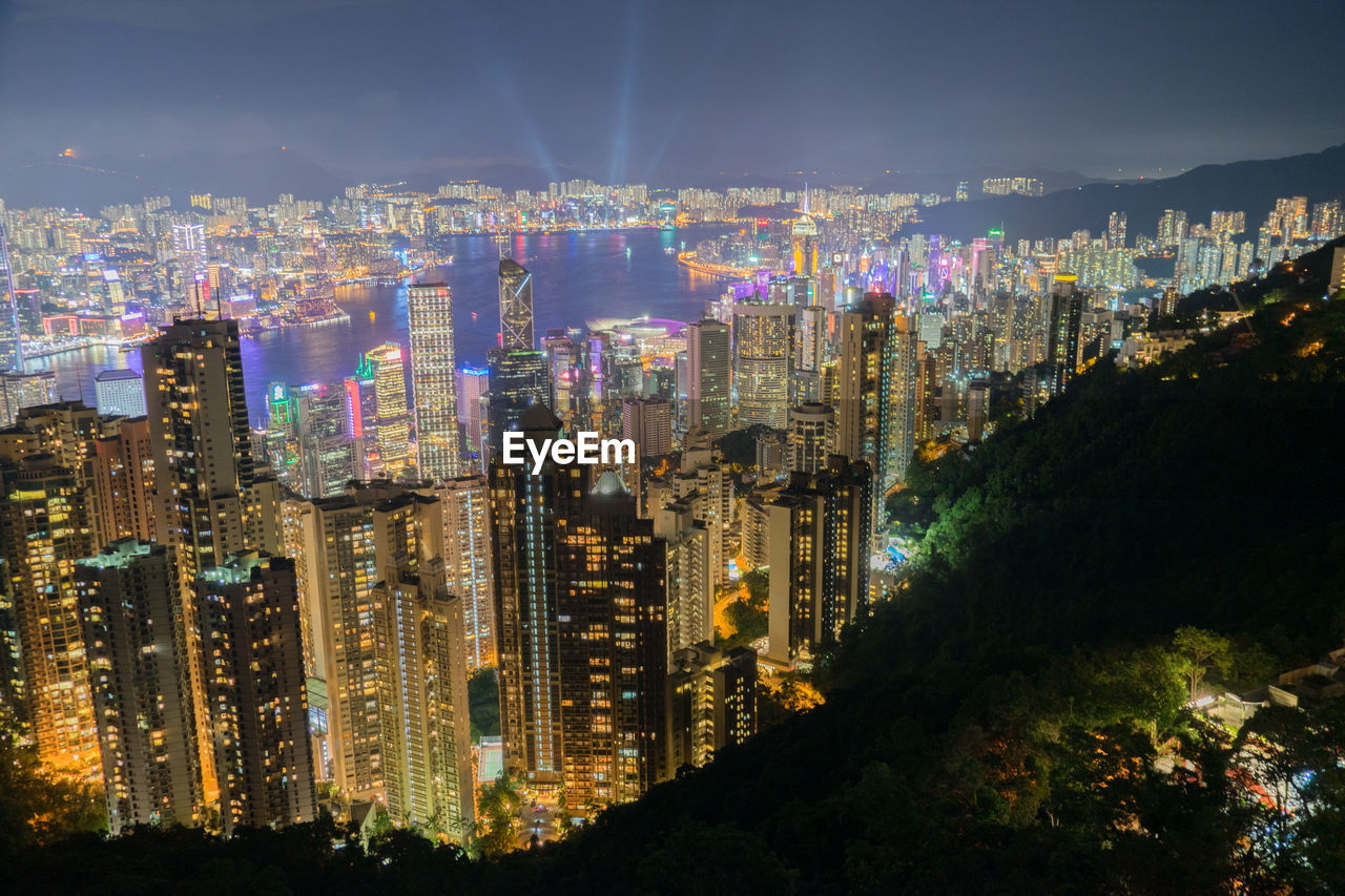 high angle view of city lit up at night