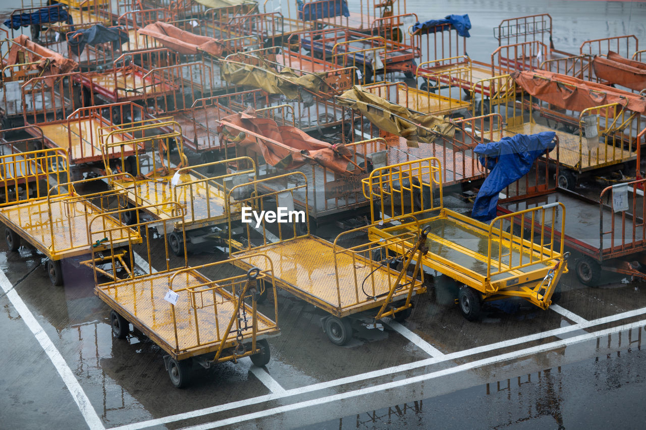 High angle view of trolleys on land