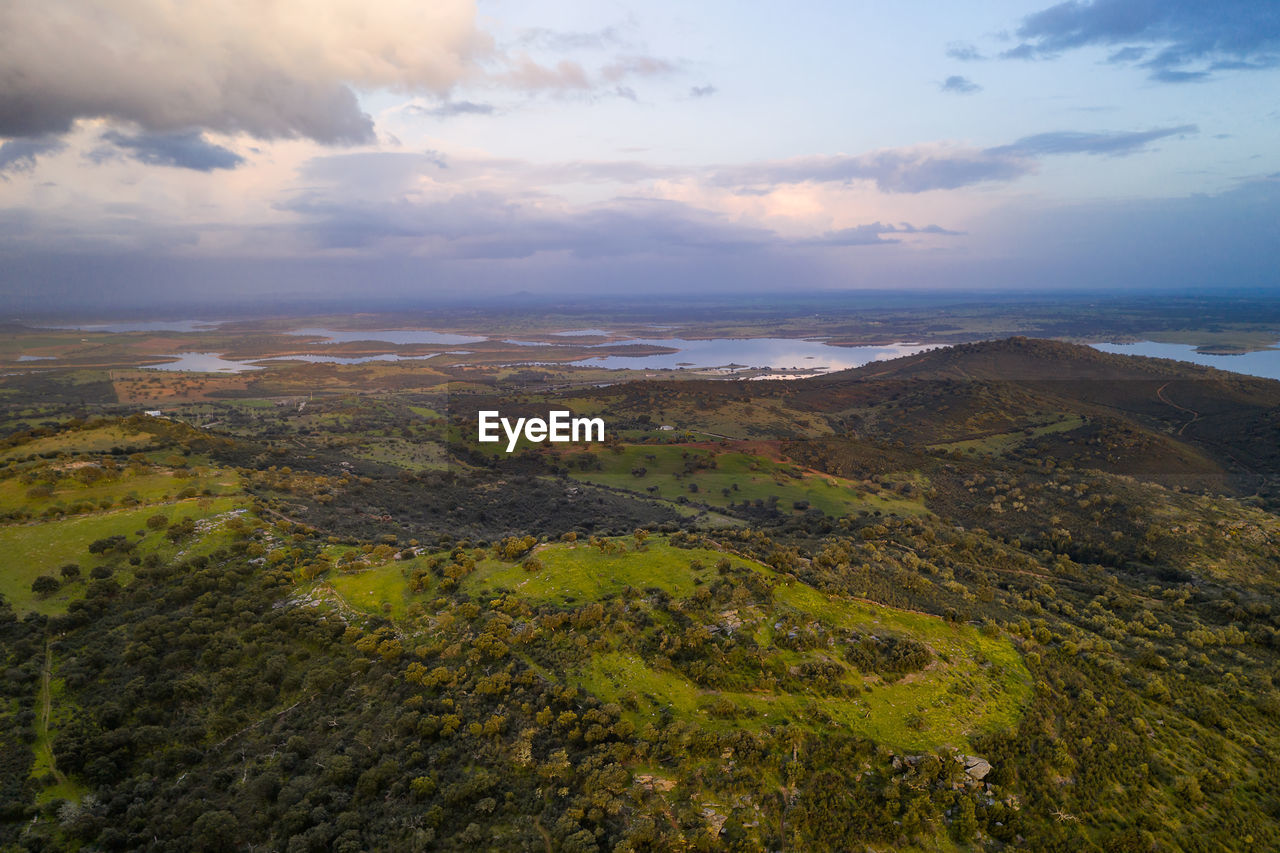 Alentejo drone aerial view of the landscape at sunset with alqueva dam reservoir, in portugal