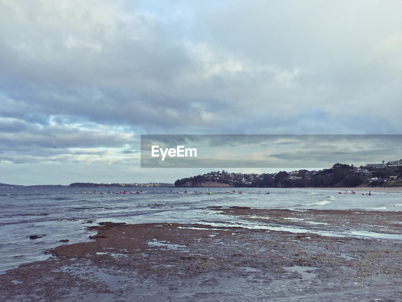 VIEW OF SEA AGAINST CLOUDY SKY