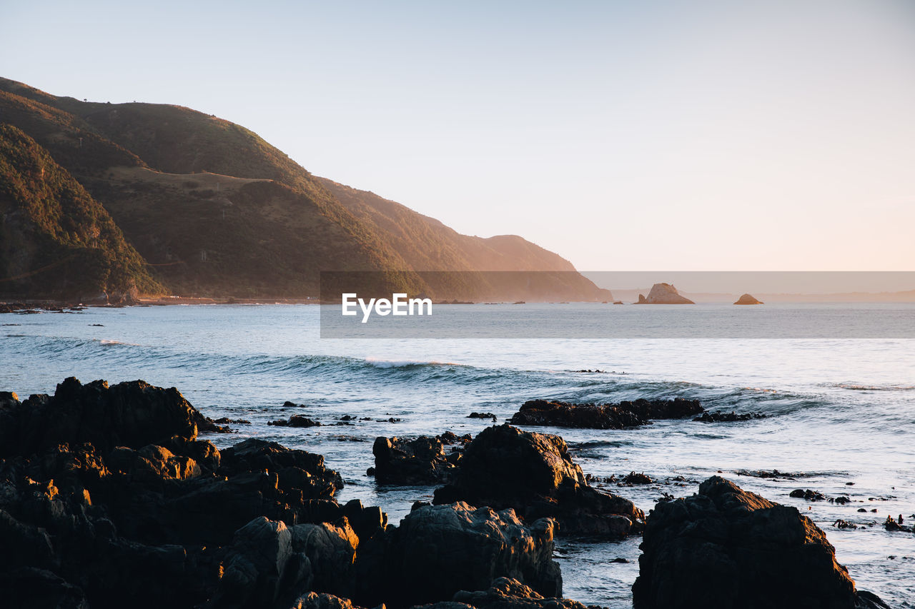 Scenic view of sea against clear sky