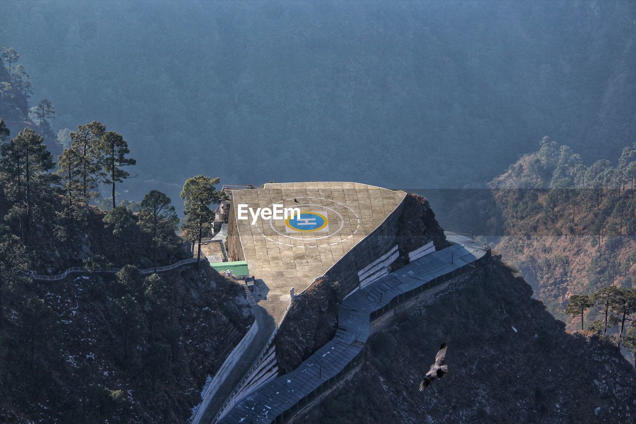 High angle view of helipad station over mountains