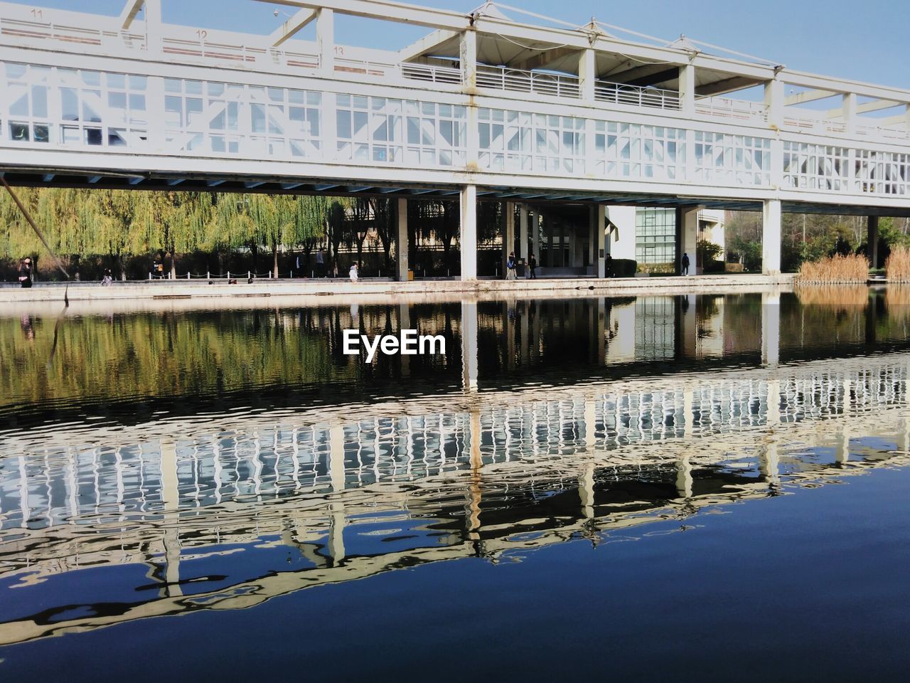 REFLECTION OF BUILT STRUCTURE AGAINST SKY