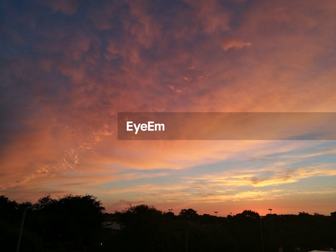 sunset, silhouette, beauty in nature, tree, sky, scenics, no people, tranquil scene, dramatic sky, nature, tranquility, cloud - sky, built structure, outdoors