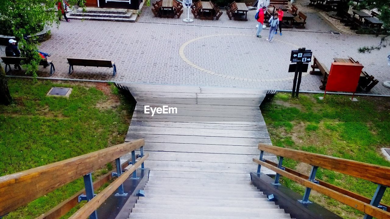High angle view of empty steps by footpath