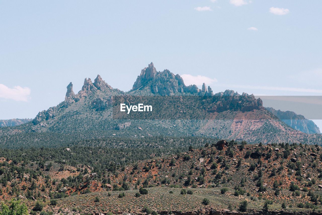 Scenic view of rocky mountains against sky