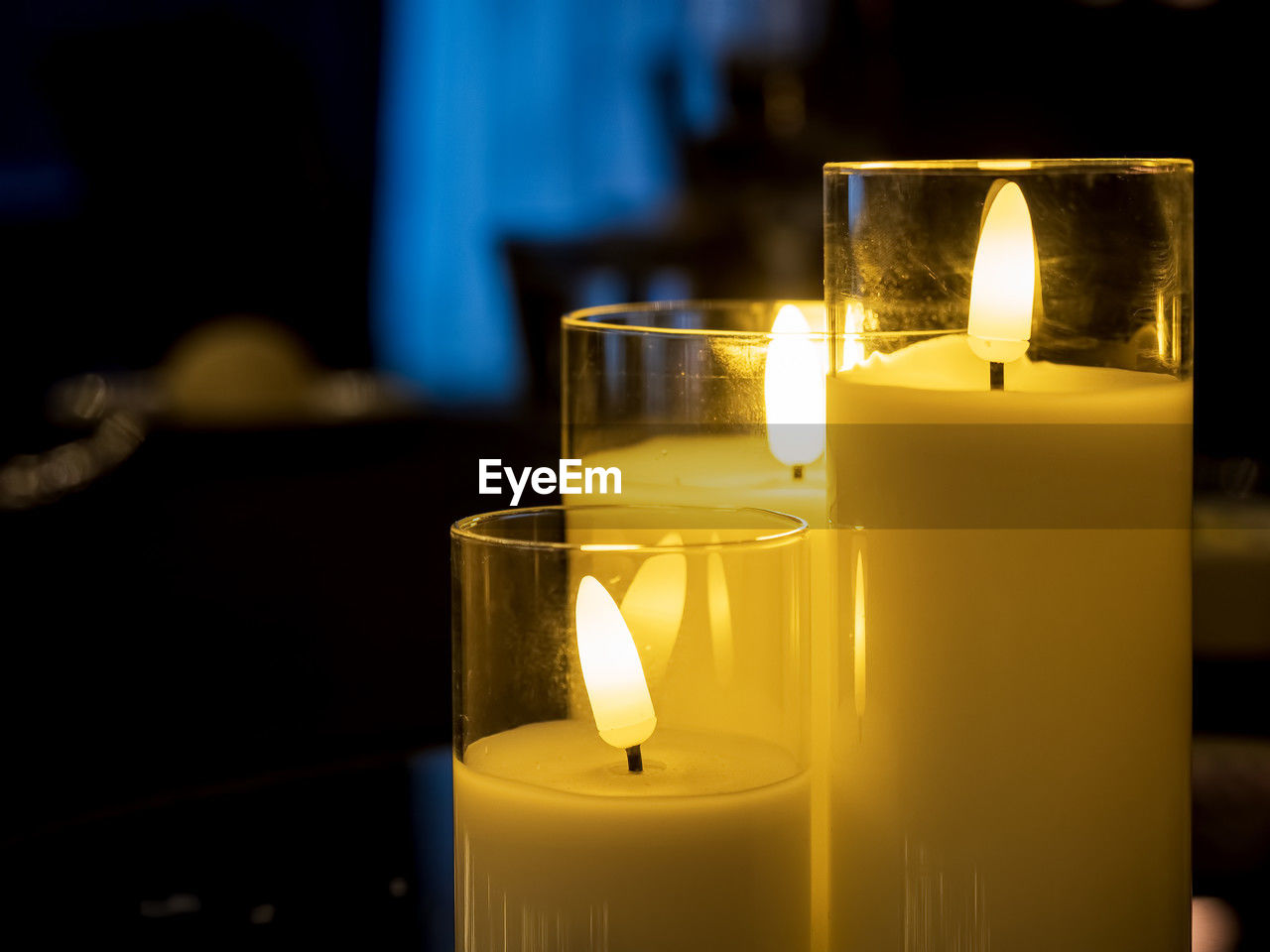 candle, fire, flame, burning, yellow, heat, flameless candle, illuminated, indoors, lighting, nature, glowing, no people, close-up, dark, glass, focus on foreground, interior design, candle holder, light, drinking glass, table, tranquility, food and drink, group of objects, decoration