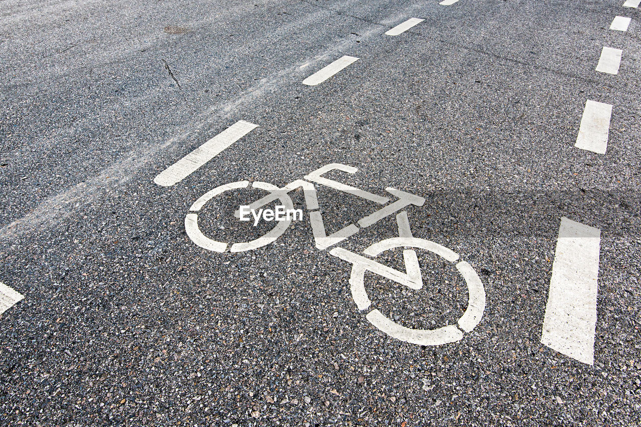 High angle view of bicycle sign road