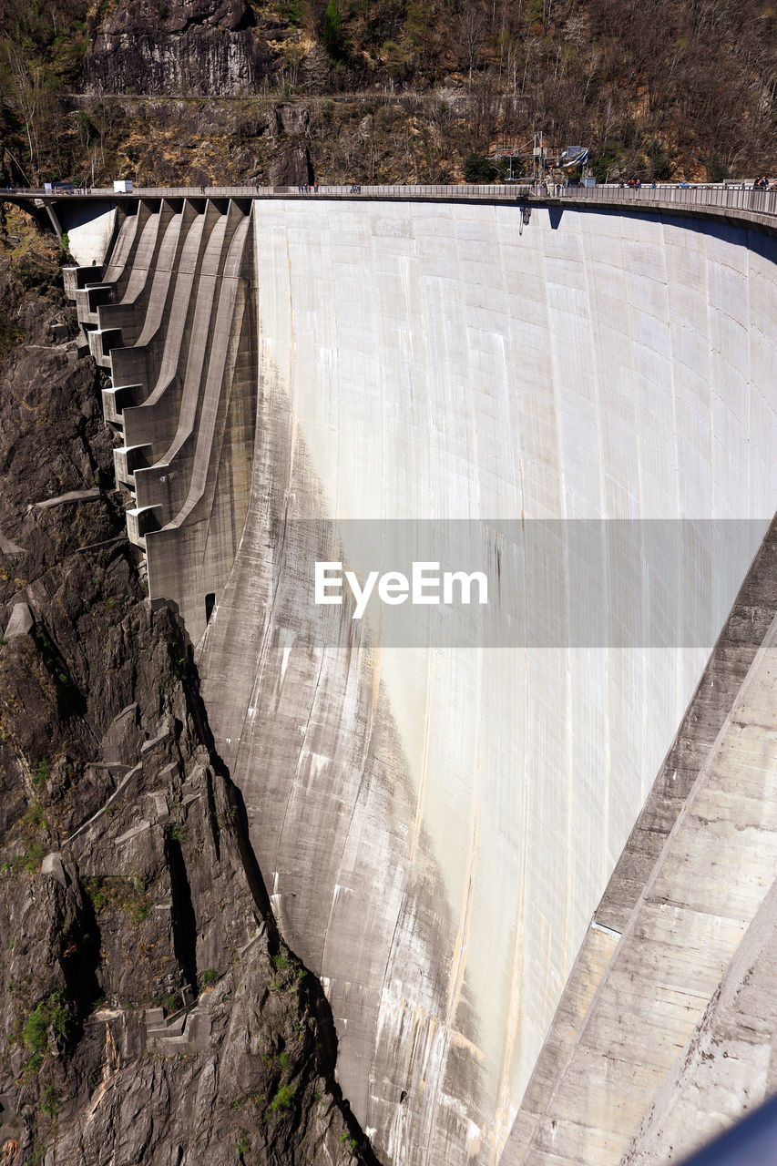 dam, hydroelectric power, power generation, renewable energy, environmental conservation, infrastructure, nature, architecture, alternative energy, built structure, water, day, environment, no people, high angle view, wall, outdoors, reservoir, technology, concrete, sunlight, travel