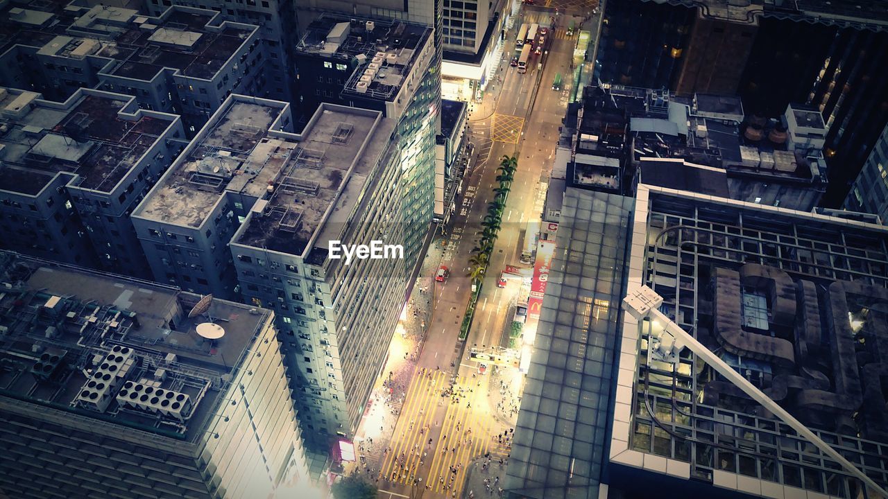 Aerial view of modern city buildings by street