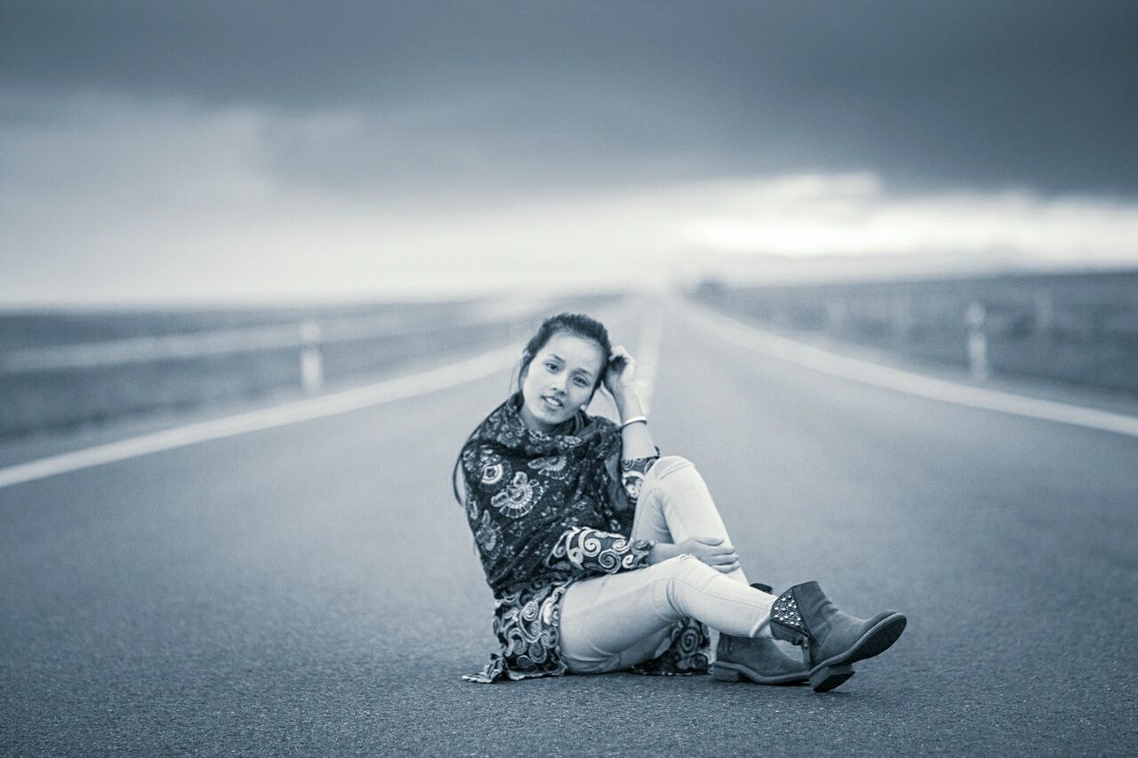 WOMAN LOOKING AT CAMERA