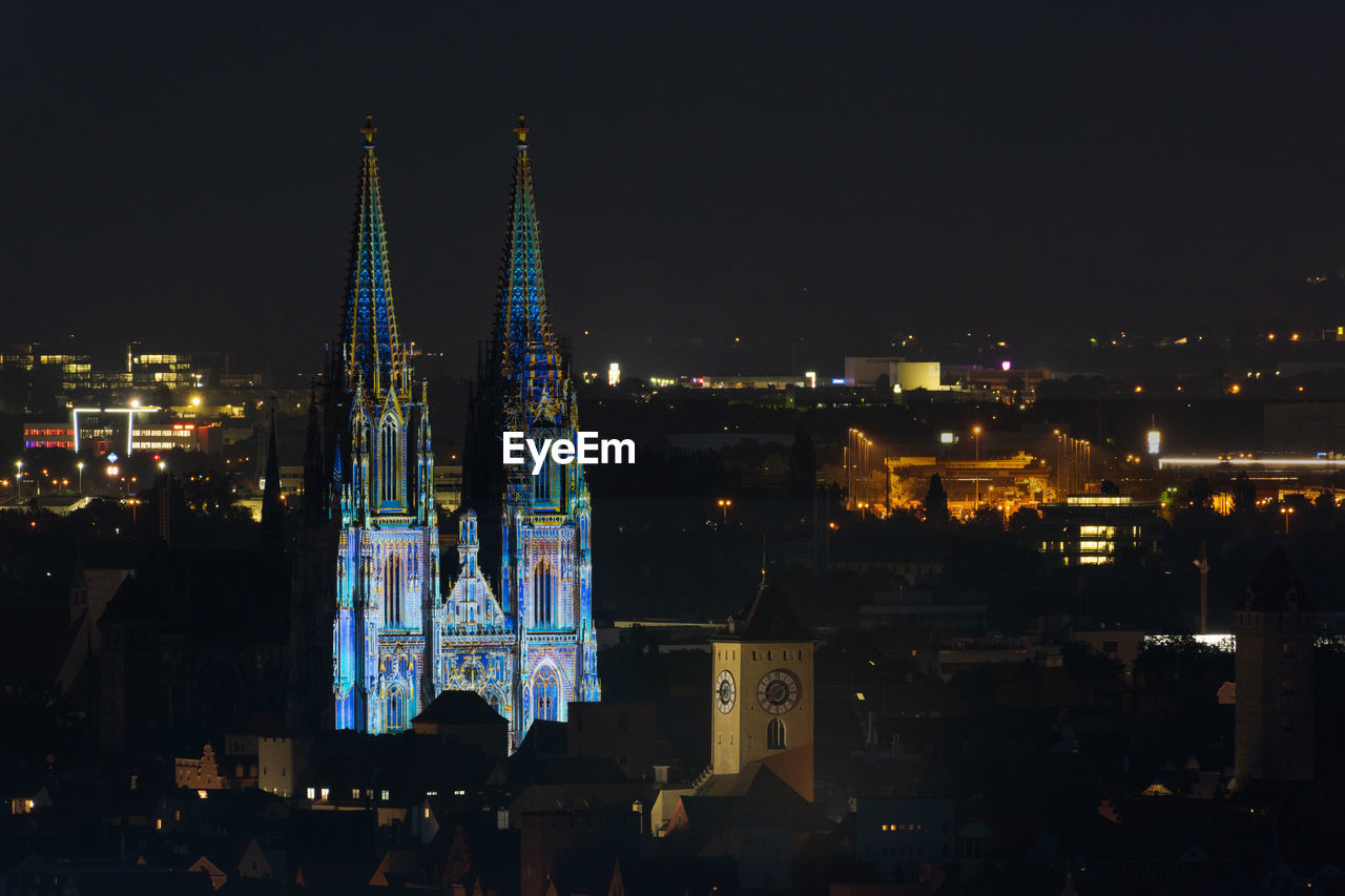 ILLUMINATED BUILDINGS AT NIGHT