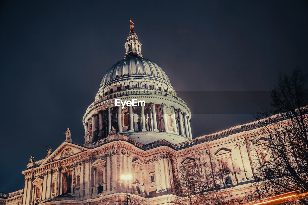 low angle view of church against sky at night