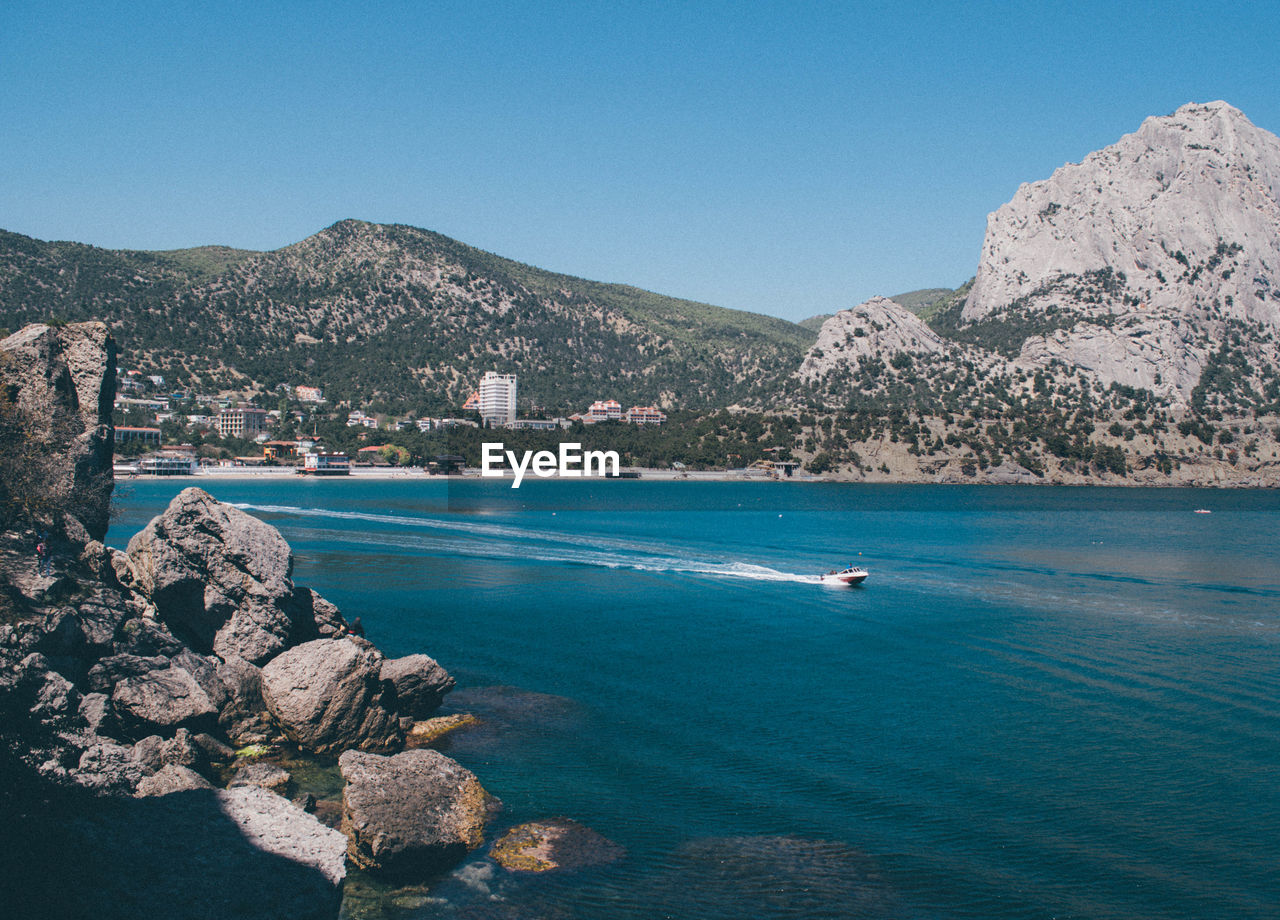 SCENIC VIEW OF SEA AGAINST BLUE SKY