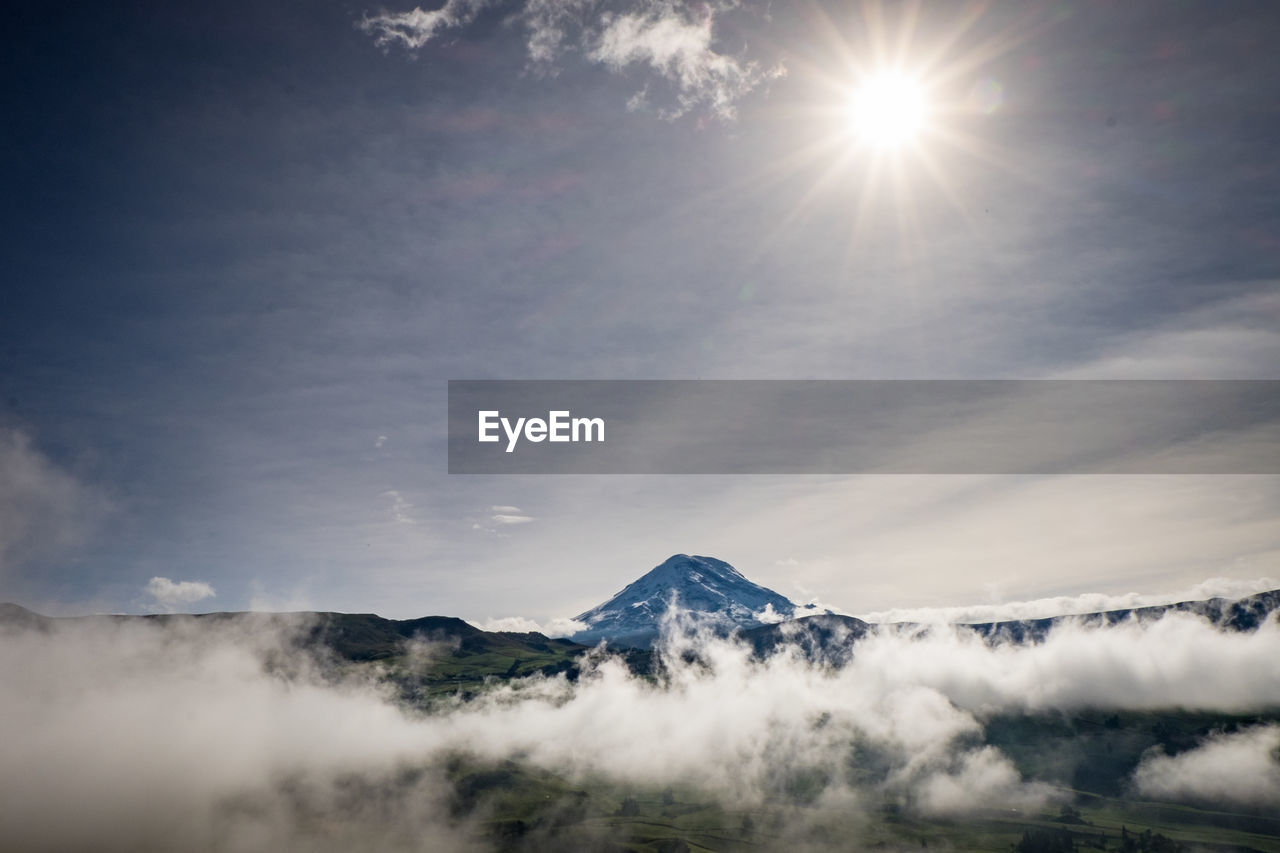 Scenic view of mountains against sky during winter