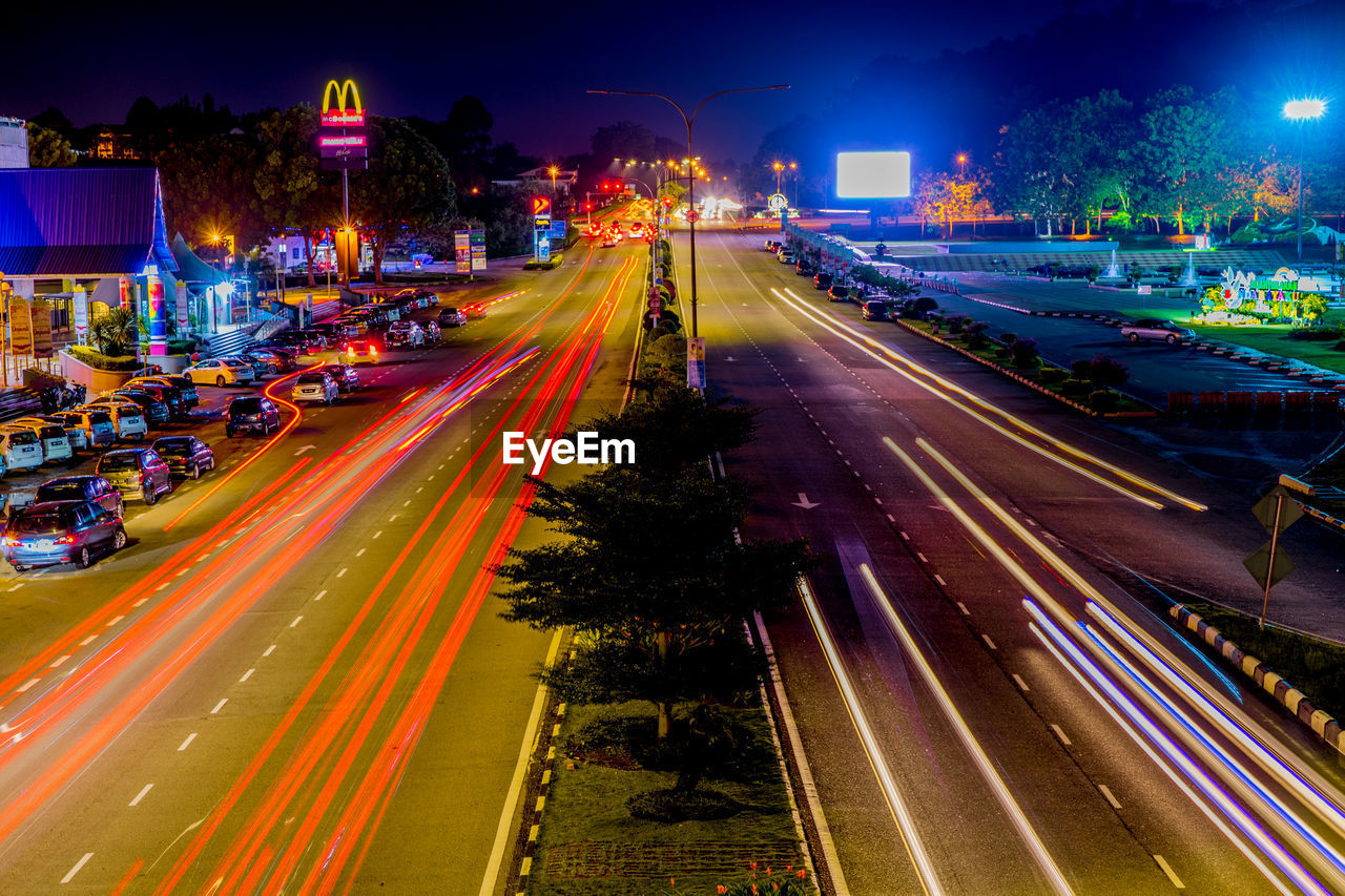 High angle view of light trails on city street