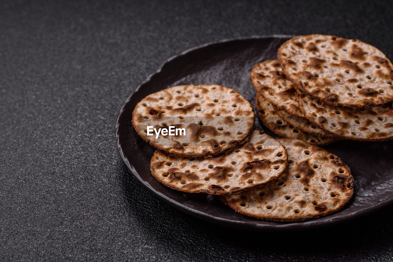 food and drink, food, baked, freshness, studio shot, meal, healthy eating, dish, indoors, breakfast, no people, bread, wellbeing, close-up, black background, still life, snack