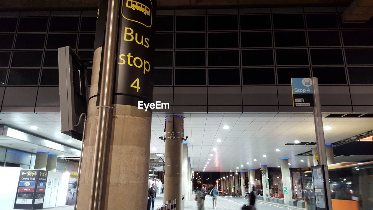 Low angle view of illuminated bus stop