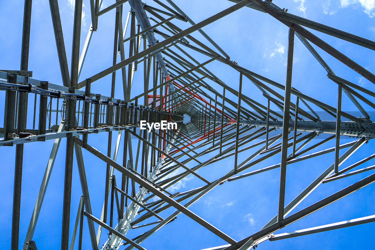 Low angle view of telephone pole technology mobile telephone base station telecommunication tower 