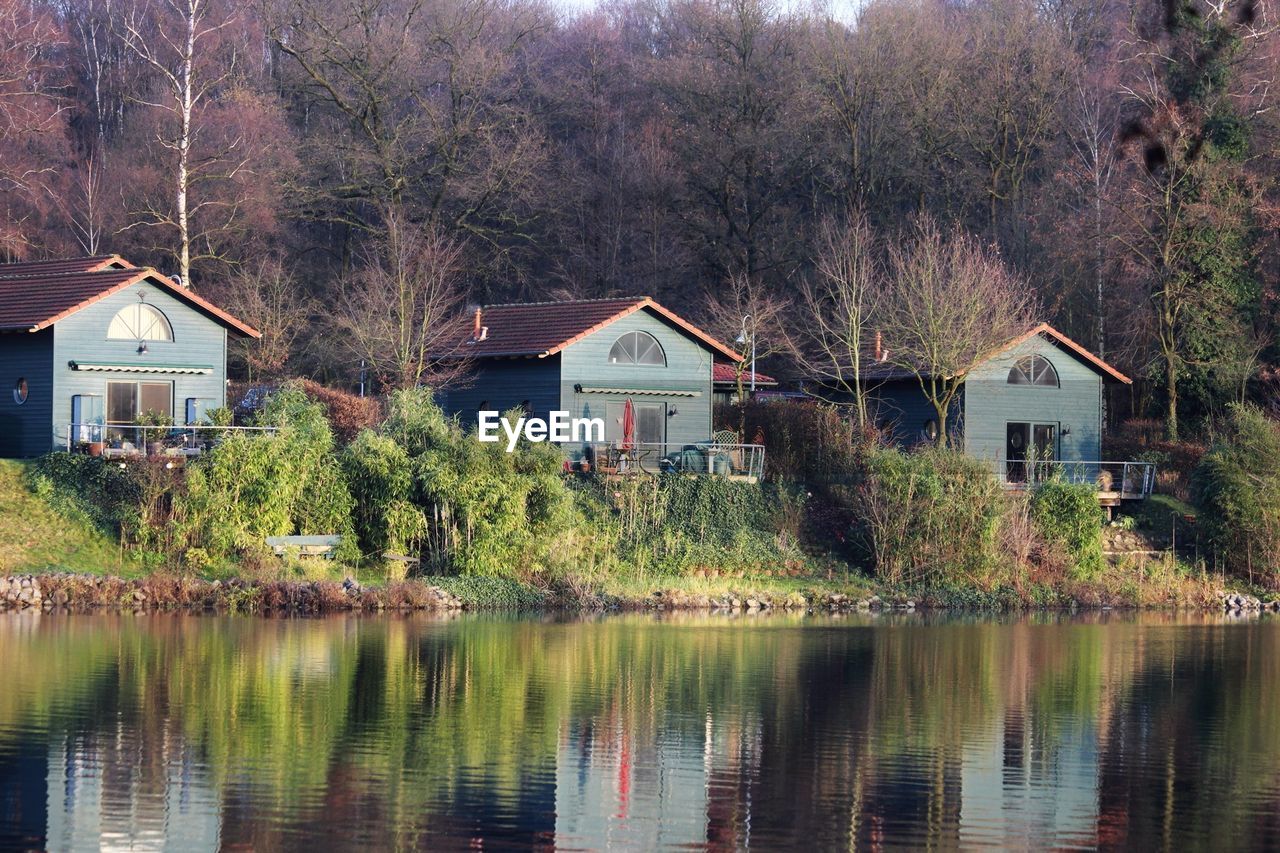 REFLECTION OF HOUSES IN WATER