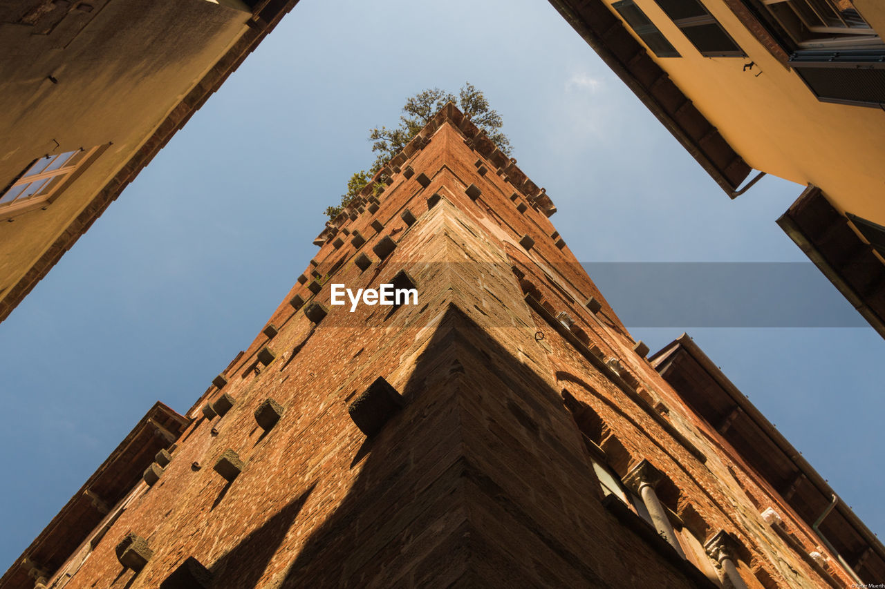 Low angle view of buildings against clear sky