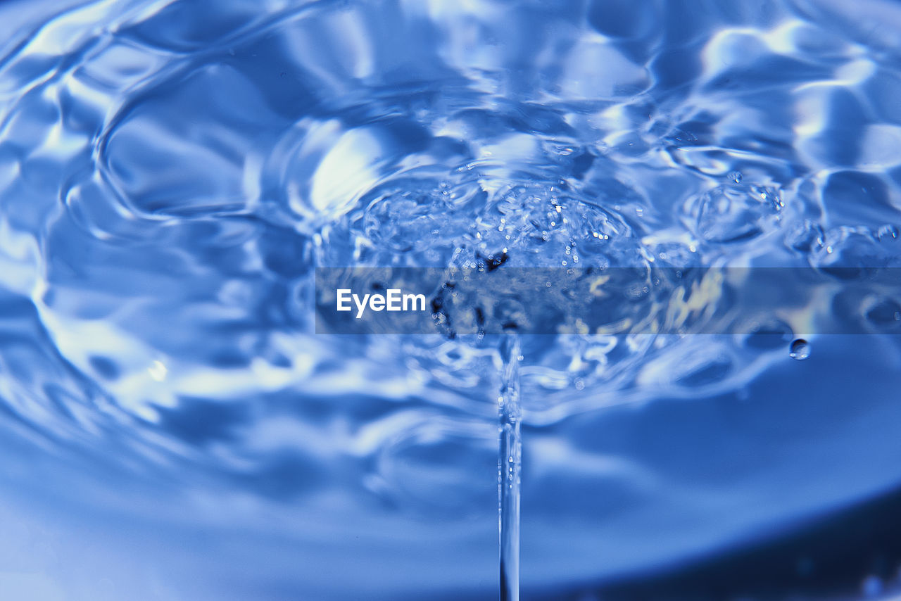 water, blue, motion, drop, azure, rippled, splashing, freshness, petal, close-up, nature, no people, mineral water, freezing, food and drink, backgrounds, cobalt blue, purity, indoors, macro photography, refreshment, falling, reflection, full frame, bubble, studio shot