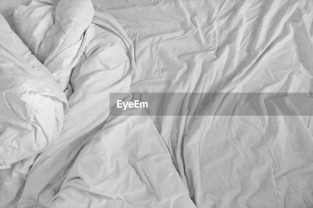 Full frame shot of crumpled sheet on bed