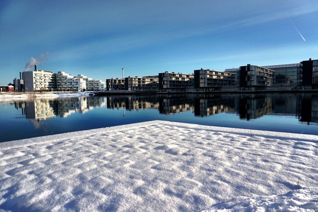 Reflection of cityscape in water