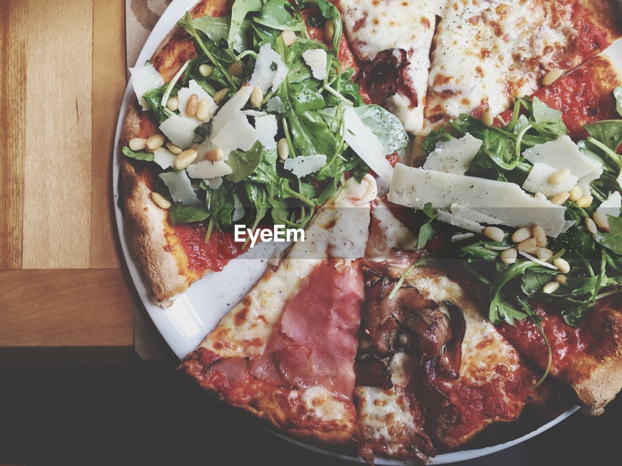 High angle view of pizza served in plate on table