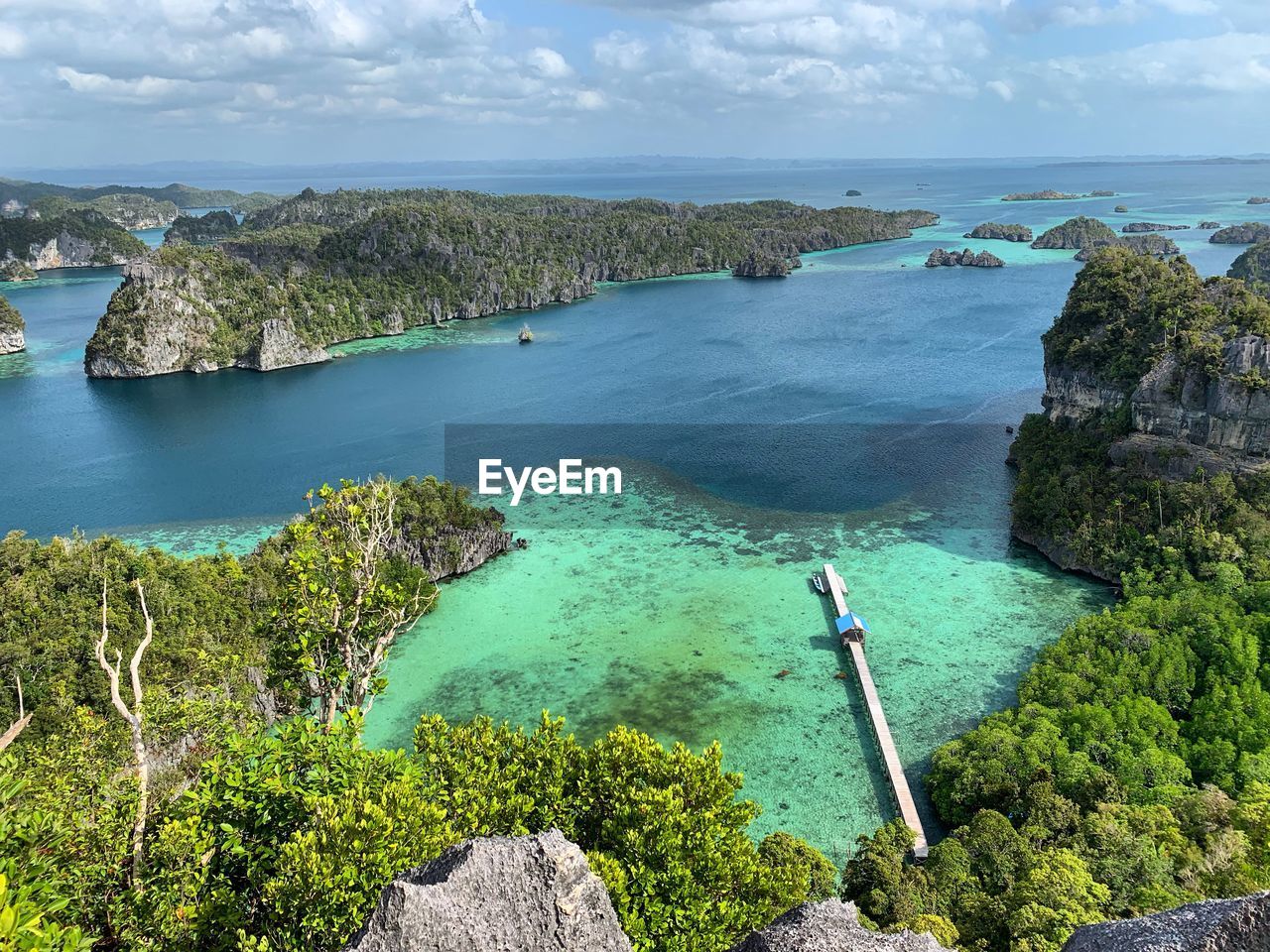 High angle view of sea against sky lagoon in raja ampat archipelago 