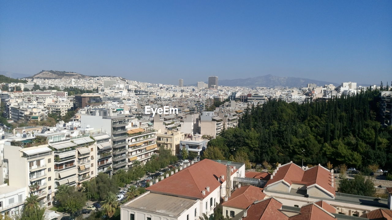 Cityscape against clear sky