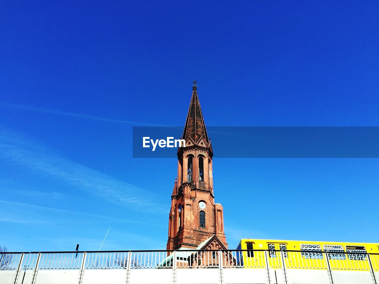 Low angle view of church against blue sky