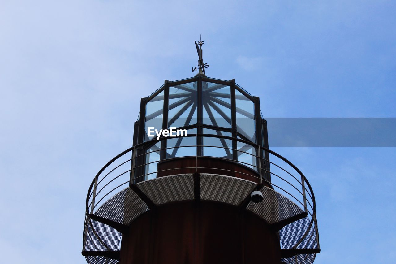 Low angle view of water tower against sky