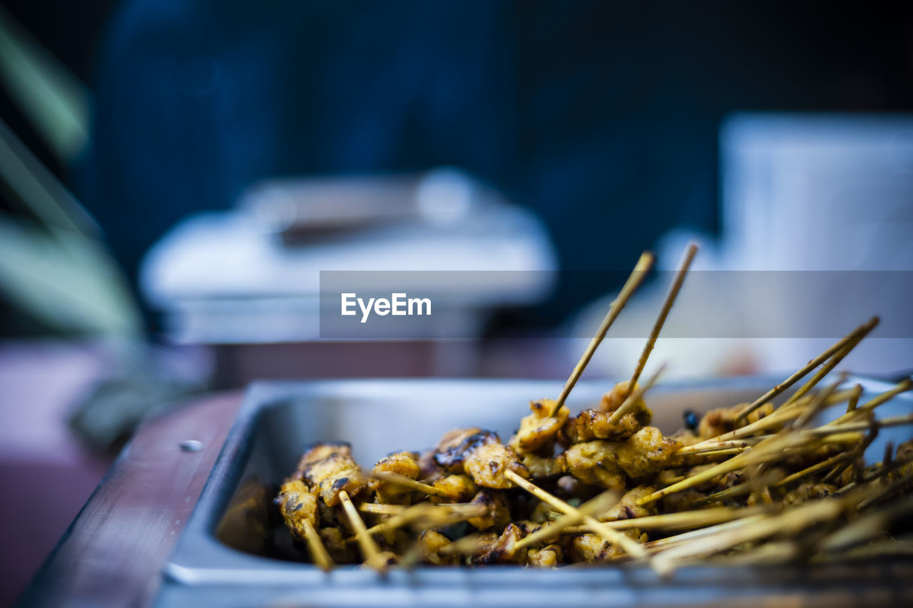 Close-up of skewered chicken