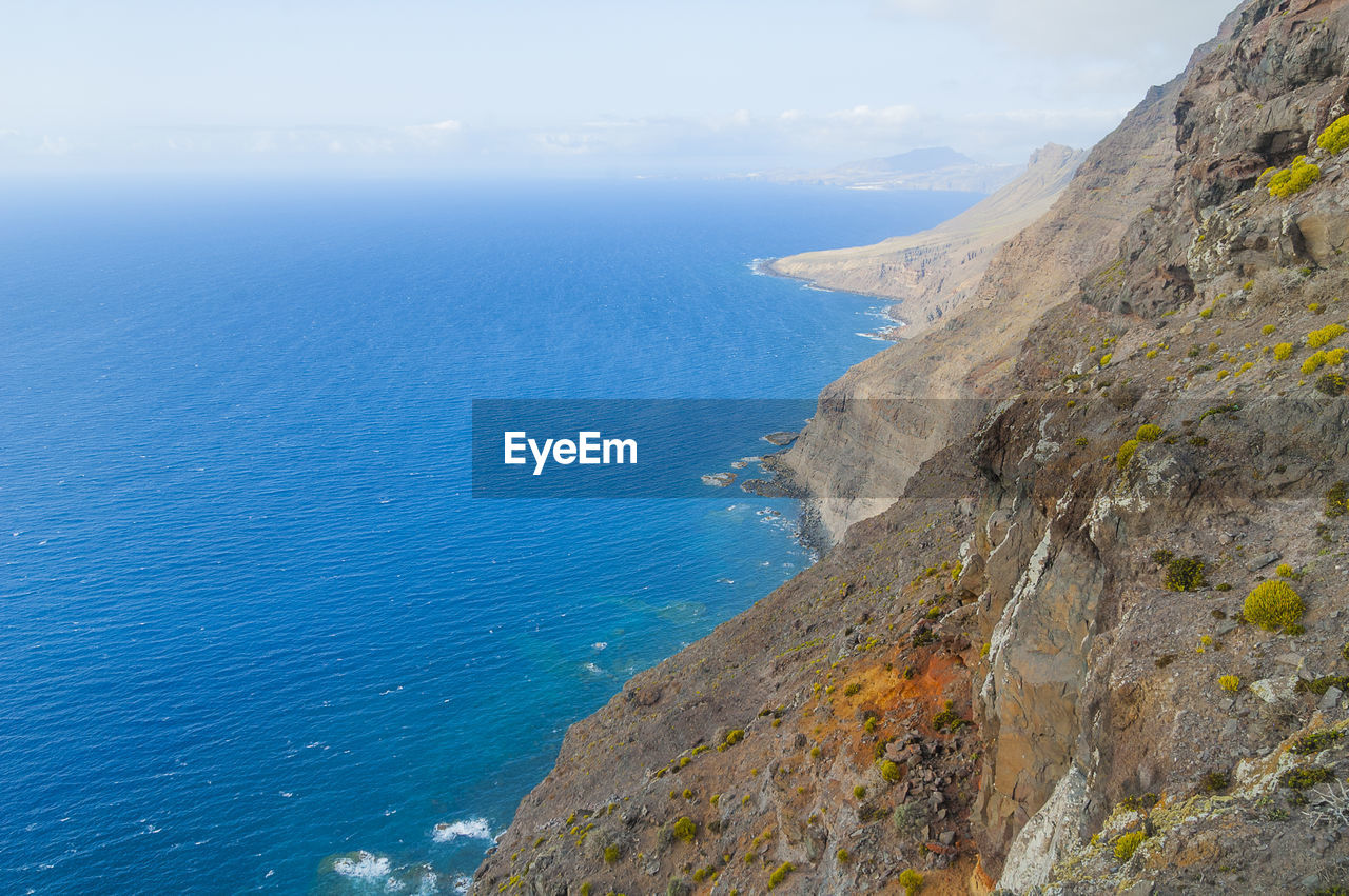 SCENIC VIEW OF SEA AGAINST BLUE SKY