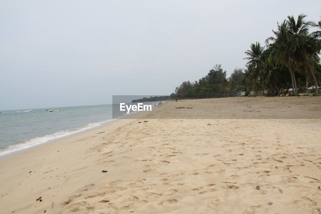 VIEW OF BEACH AGAINST CLEAR SKY