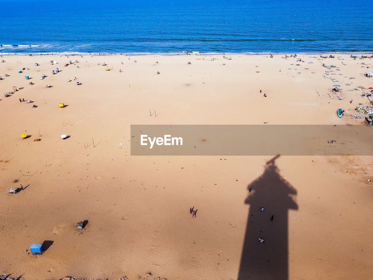 HIGH ANGLE VIEW OF BEACH AGAINST SKY