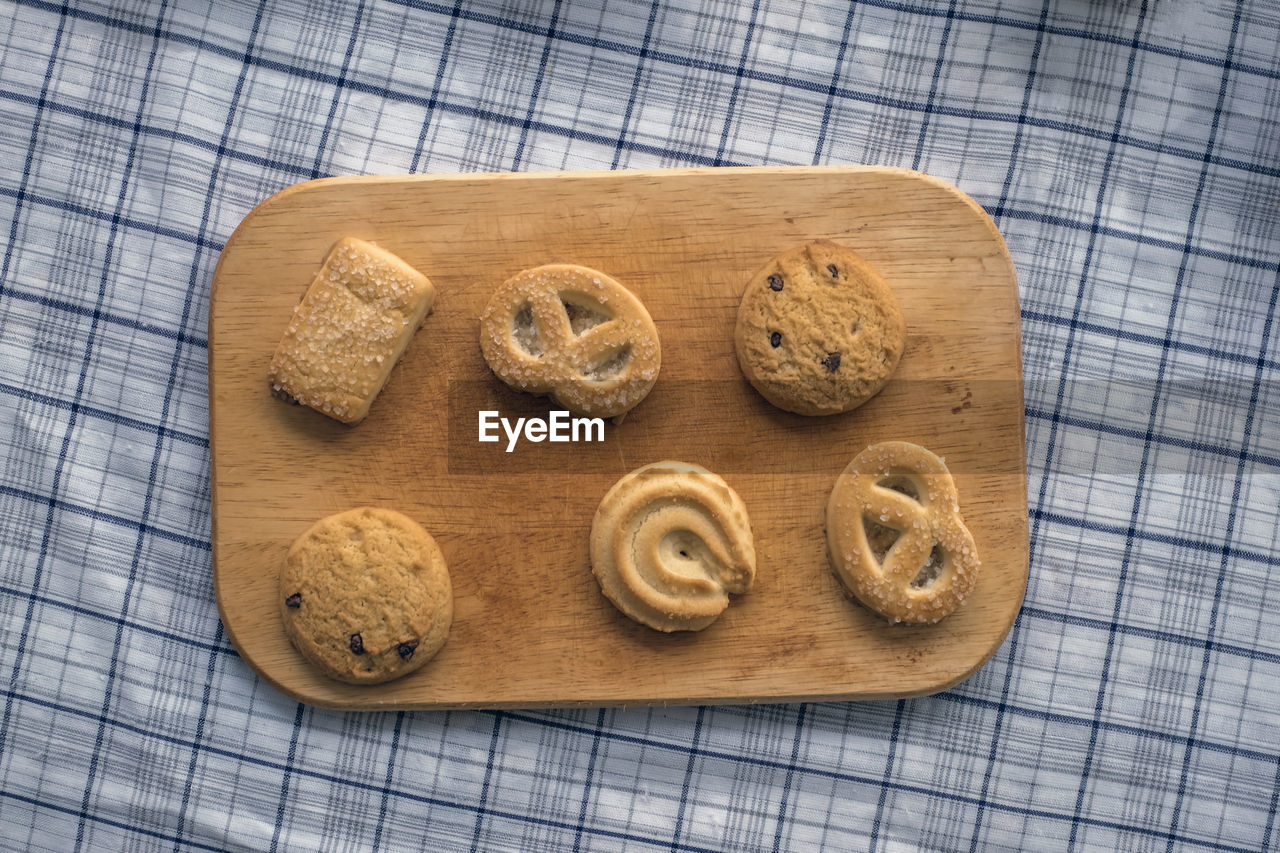 Cookie on an old wooden board on the table