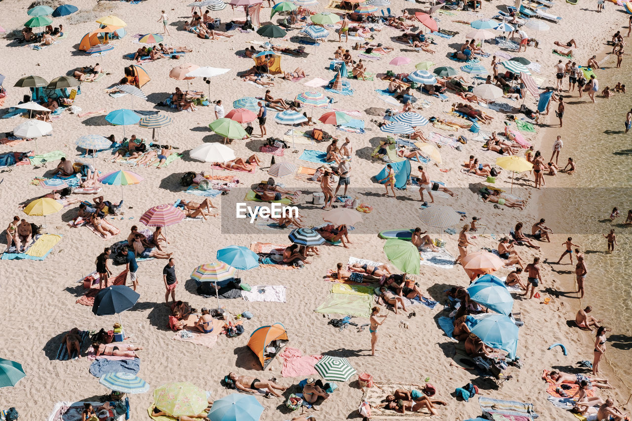 High angle view of colorful umbrellas on beach