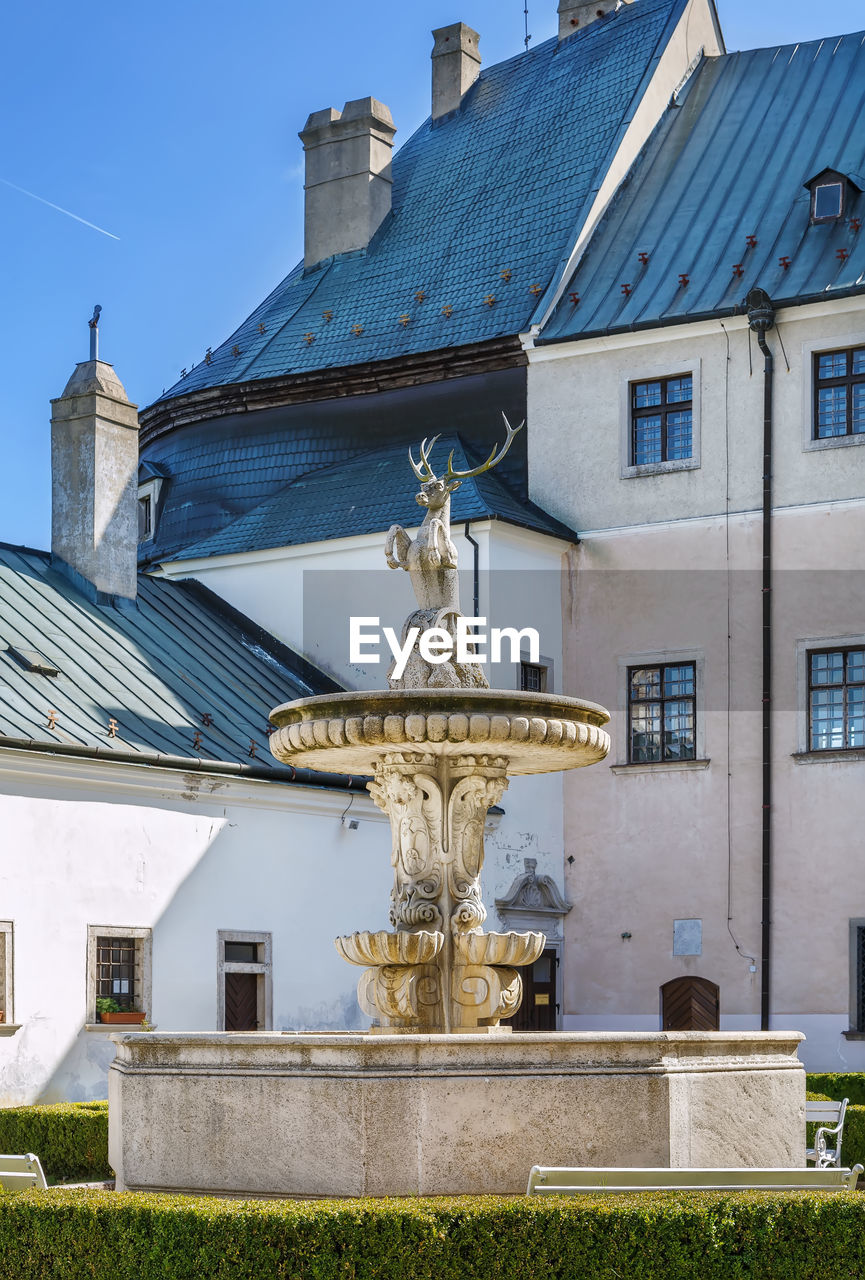 Cerveny kamen castle is a 13th-century castle in southwestern slovakia. fountain in courtyard