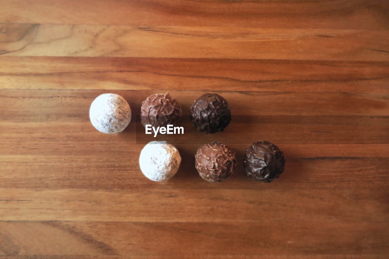 Directly above shot of chocolate truffles on table