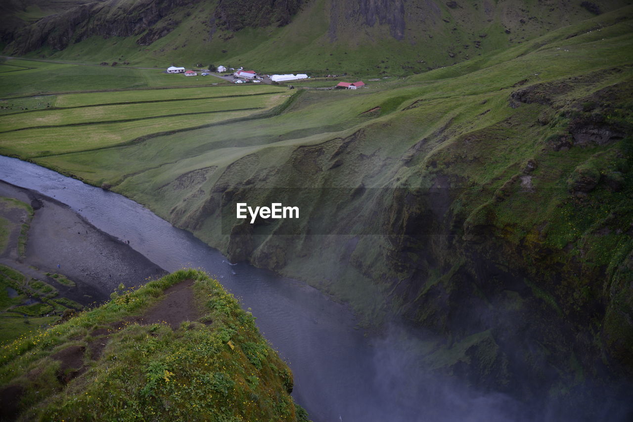 SCENIC VIEW OF RIVER AMIDST TREES