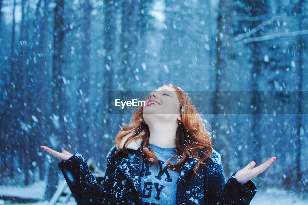 Close-up of woman in snow